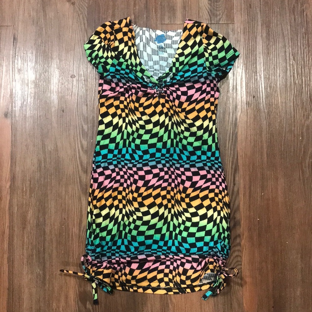 Small teen dress. Cut and braided in the center chest.